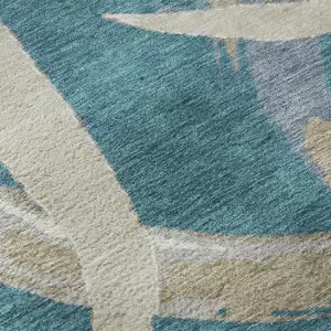 Photo of Teal Ivory And Gray Abstract Washable Area Rug With UV Protection