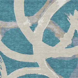 Photo of Teal Ivory And Gray Abstract Washable Area Rug With UV Protection
