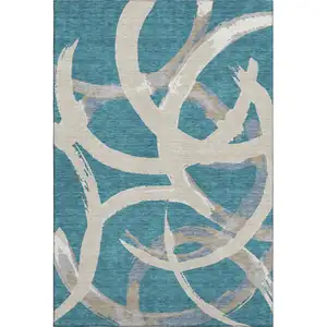 Photo of Teal Ivory And Gray Abstract Washable Area Rug With UV Protection