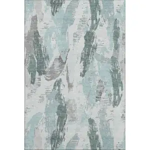 Photo of Teal Ivory And Gray Abstract Washable Area Rug With UV Protection