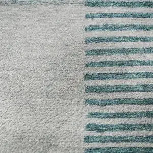 Photo of Teal Ivory And Gray Geometric Washable Area Rug With UV Protection