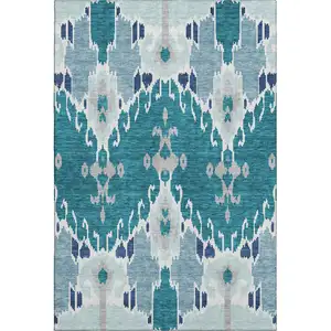 Photo of Teal Ivory And Gray Ikat Washable Area Rug With UV Protection