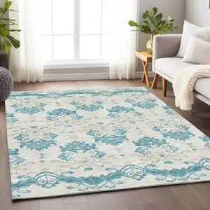 Photo of Teal Ivory And Gray Medallion Washable Area Rug With UV Protection