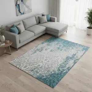 Photo of Teal Ivory And Gray Medallion Washable Area Rug With UV Protection