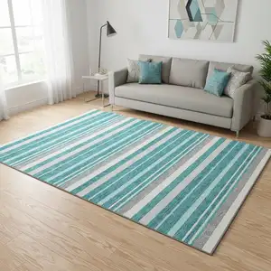 Photo of Teal Ivory And Gray Striped Washable Area Rug With UV Protection