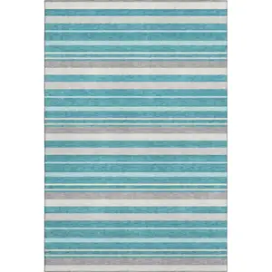 Photo of Teal Ivory And Gray Striped Washable Area Rug With UV Protection