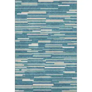 Photo of Teal Ivory And Gray Striped Washable Area Rug With UV Protection