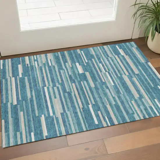 Teal Ivory And Gray Striped Washable Area Rug With UV Protection Photo 1