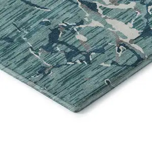 Photo of Teal Ivory And Gray Striped Washable Area Rug With UV Protection
