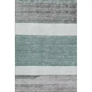 Photo of Teal Ivory And Gray Striped Washable Area Rug With UV Protection