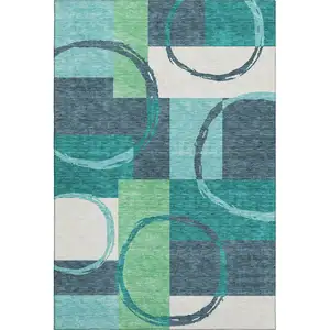 Photo of Teal Ivory And Green Geometric Washable Area Rug With UV Protection