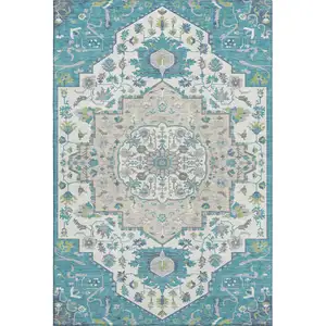 Photo of Teal Ivory And Green Oriental Washable Area Rug With UV Protection