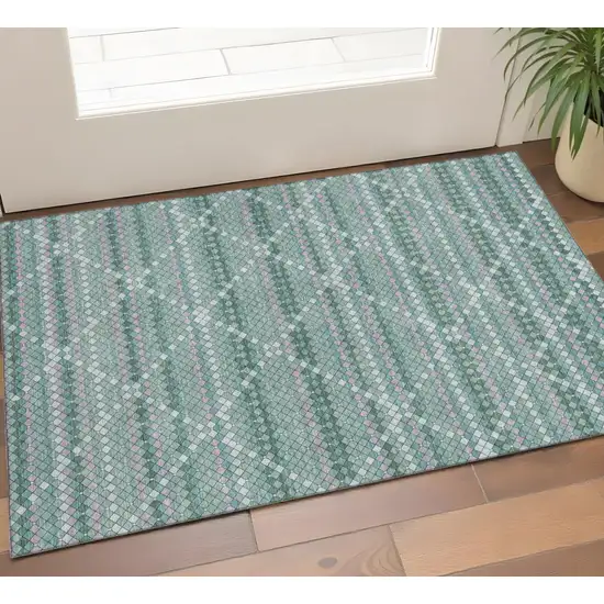 Teal Ivory And Lavender Geometric Washable Area Rug With UV Protection Photo 1
