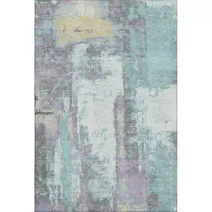 Photo of Teal Ivory And Purple Abstract Washable Area Rug With UV Protection