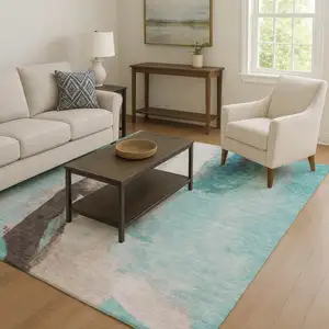 Photo of Teal Khaki And Ivory Abstract Washable Area Rug With UV Protection