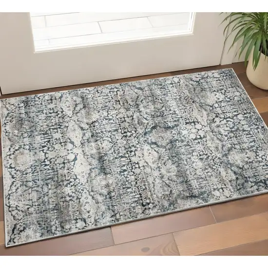 Teal And Ivory Floral Area Rug Photo 1