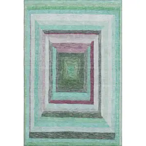 Photo of Teal Mauve And Ivory Geometric Washable Area Rug With UV Protection