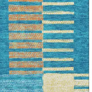 Photo of Teal Orange And Gold Striped Washable Area Rug With UV Protection