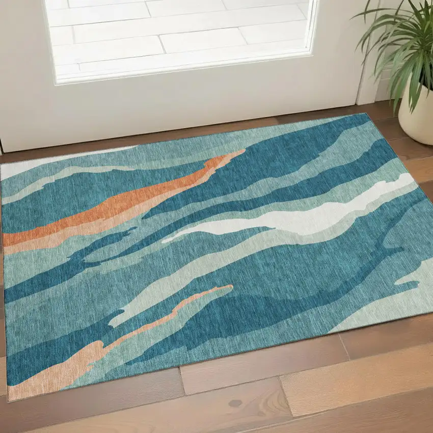 Teal Orange And Ivory Abstract Washable Area Rug With UV Protection Photo 1