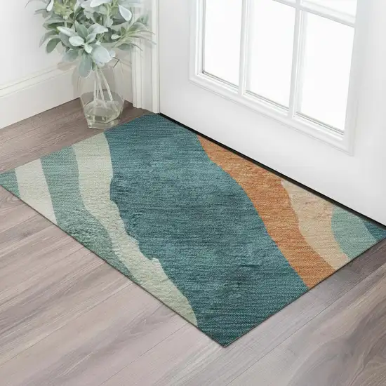 Teal Orange And Ivory Abstract Washable Area Rug With UV Protection Photo 2