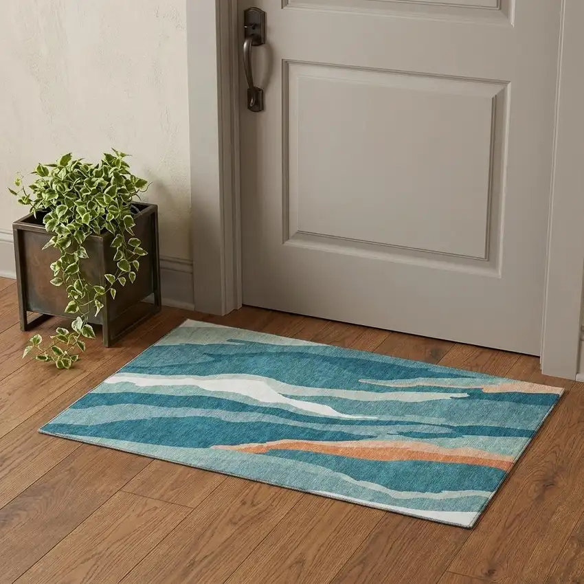 Teal Orange And Ivory Abstract Washable Area Rug With UV Protection Photo 1