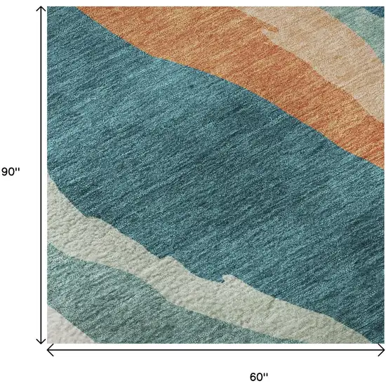 Teal Orange And Ivory Abstract Washable Area Rug With UV Protection Photo 9