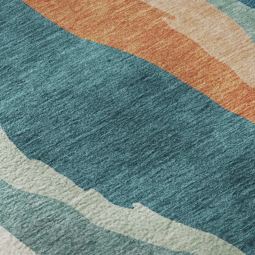 Teal Orange And Ivory Abstract Washable Area Rug With UV Protection Photo 1