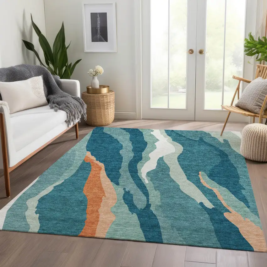 Teal Orange And Ivory Abstract Washable Area Rug With UV Protection Photo 3