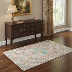 Photo of Teal Orange And Ivory Medallion Area Rug