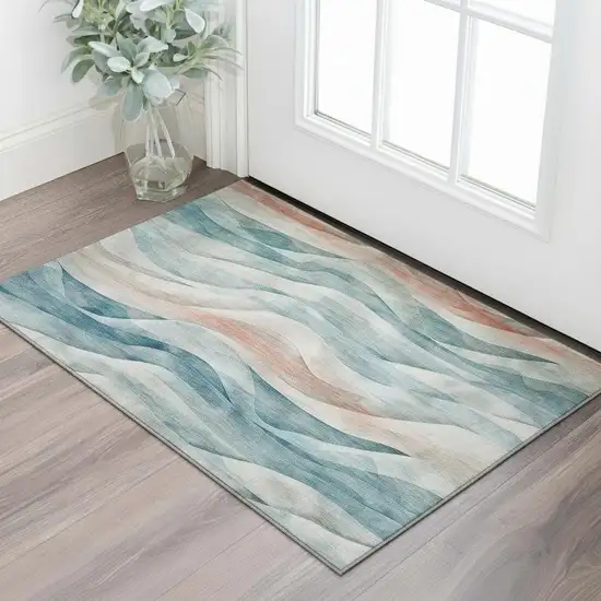 Teal Peach And Ivory Abstract Washable Area Rug With UV Protection Photo 2