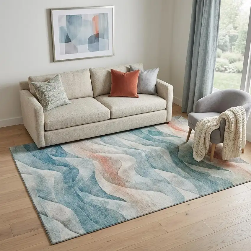 Teal Peach And Ivory Abstract Washable Area Rug With UV Protection Photo 1