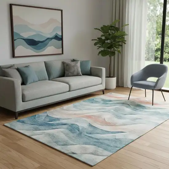Teal Peach And Ivory Abstract Washable Area Rug With UV Protection Photo 2