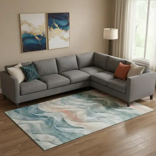 Teal Peach And Ivory Abstract Washable Area Rug With UV Protection Photo 2