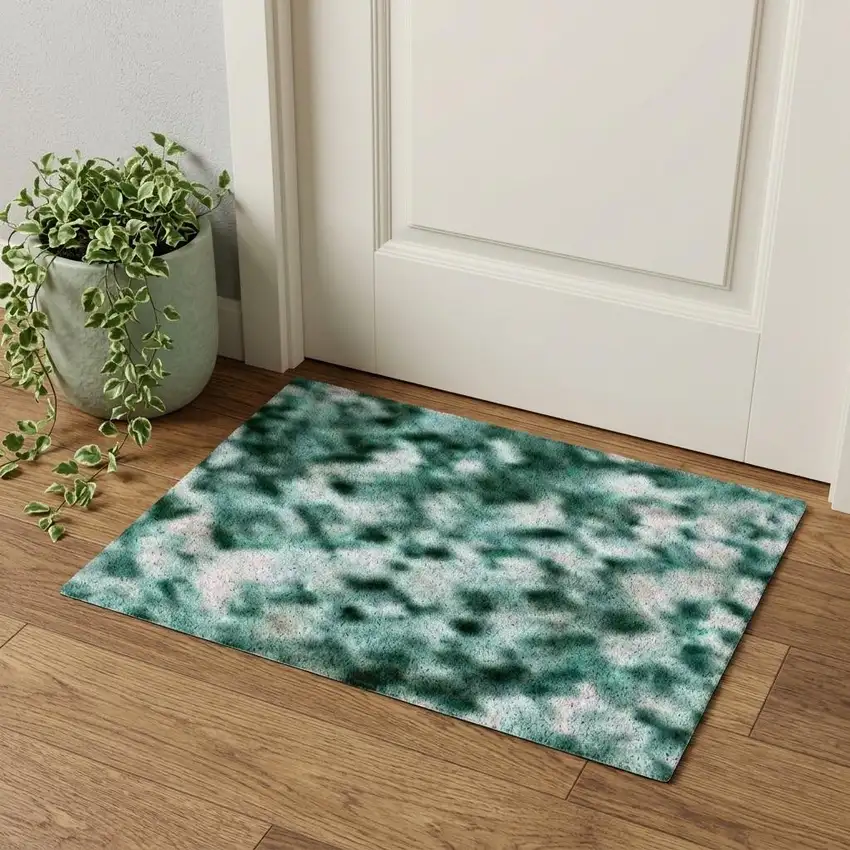 Teal Peach And Ivory Abstract Washable Area Rug With UV Protection Photo 1