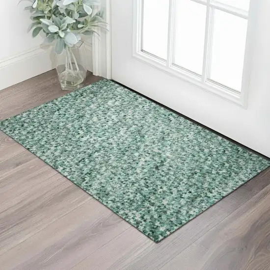 Teal Peach And Ivory Abstract Washable Area Rug With UV Protection Photo 2