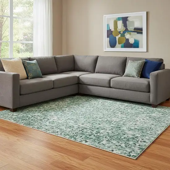 Teal Peach And Ivory Abstract Washable Area Rug With UV Protection Photo 2