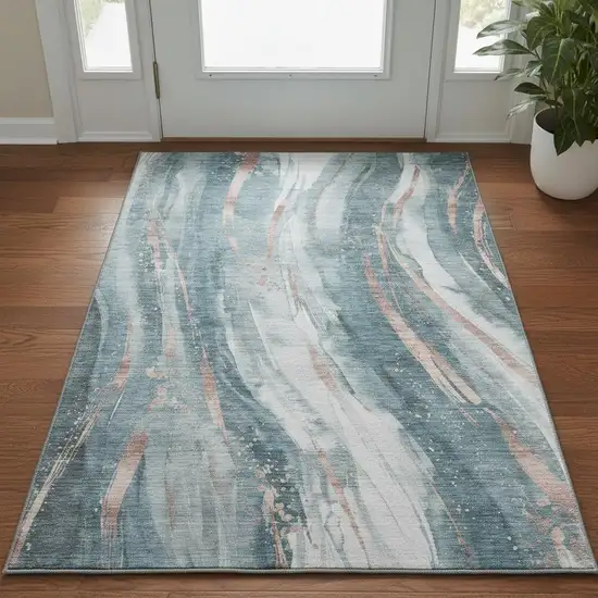 Teal Peach And Ivory Abstract Washable Area Rug With UV Protection Photo 2