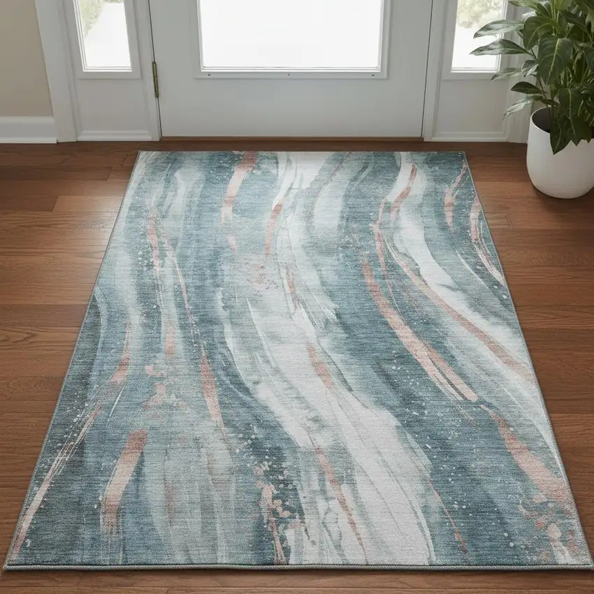 Teal Peach And Ivory Abstract Washable Area Rug With UV Protection Photo 2