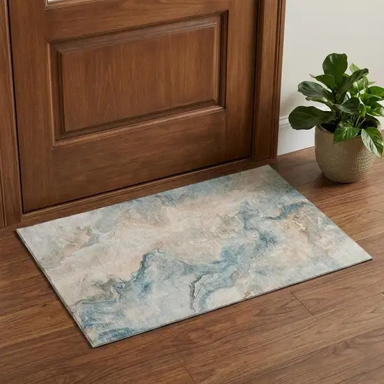 Teal Peach And Ivory Abstract Washable Area Rug With UV Protection Photo 1