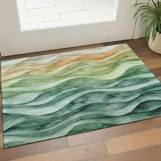 Teal Peach And Lime Green Abstract Washable Area Rug With UV Protection Photo 2