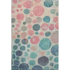Photo of Teal Pink And Beige Geometric Washable Area Rug With UV Protection