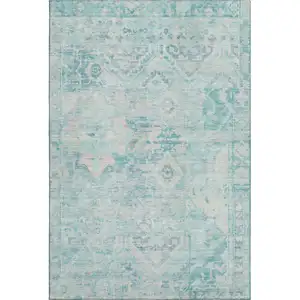 Photo of Teal Pink And Gray Floral Washable Area Rug With UV Protection
