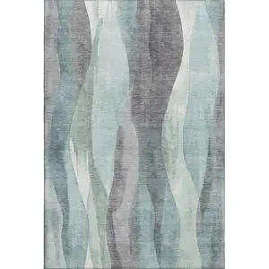 Photo of Teal Plum And Ivory Abstract Washable Area Rug With UV Protection