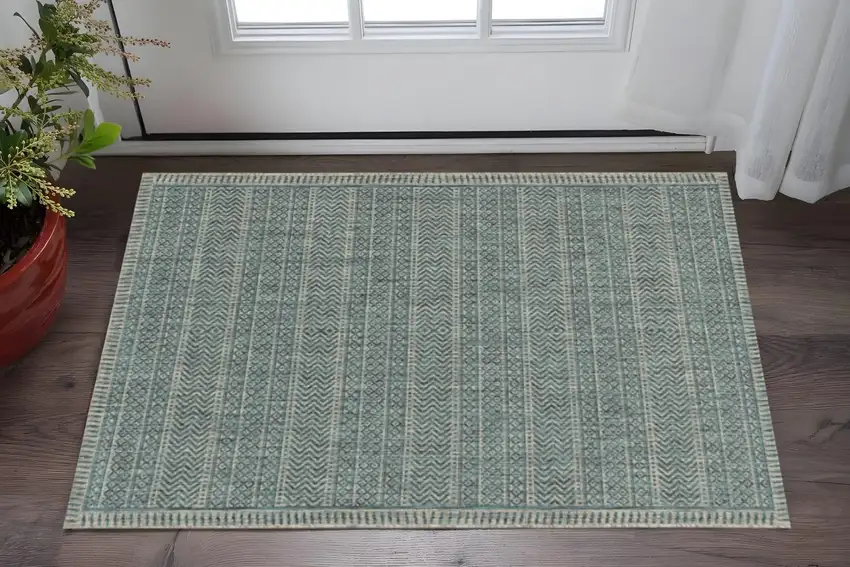 Teal And Beige Geometric Area Rug Photo 1