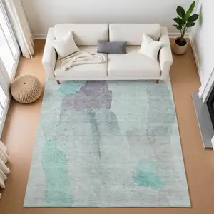 Photo of Teal Purple And Gray Abstract Washable Area Rug With UV Protection
