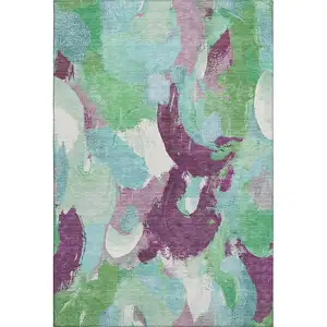 Photo of Teal Purple And Green Abstract Washable Area Rug With UV Protection