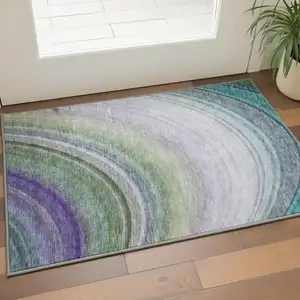 Photo of Teal Purple And Green Ombre Washable Area Rug With UV Protection
