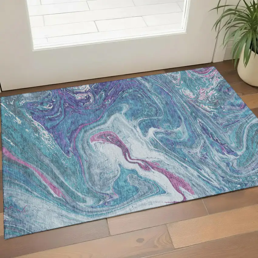 Teal Purple And Ivory Abstract Washable Area Rug With UV Protection Photo 1