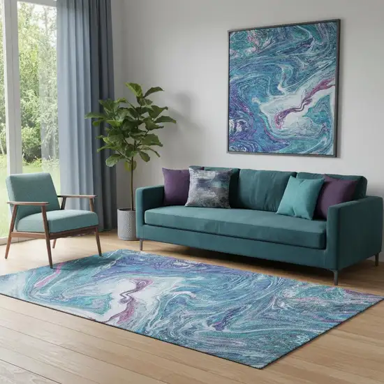 Teal Purple And Ivory Abstract Washable Area Rug With UV Protection Photo 1