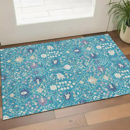 Teal Purple And Ivory Oriental Washable Area Rug With UV Protection Photo 1